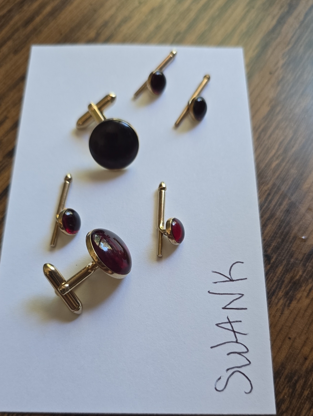 Vintage Gold-Tone Menโs Cufflink and Stud Set with Deep Red Cabochon-Swank